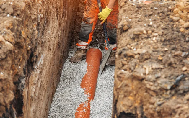 French drain system installation for home foundation drainage protection